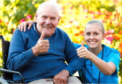 caregiver and elderly patient doing the okay sign